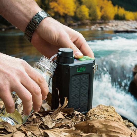 Portable Water Purification System with Solar Panel and Hand Crank